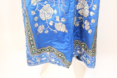 Lot 143 - A Chinese blue-ground silk embroidered lady’s...
