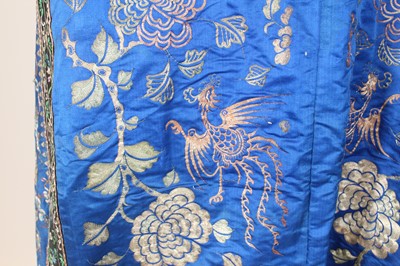 Lot 143 - A Chinese blue-ground silk embroidered lady’s...