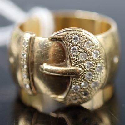 Lot 329 - A 9ct gold and diamond set belt ring, the...