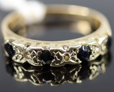 Lot 337 - A 9ct gold sapphire and diamond point...