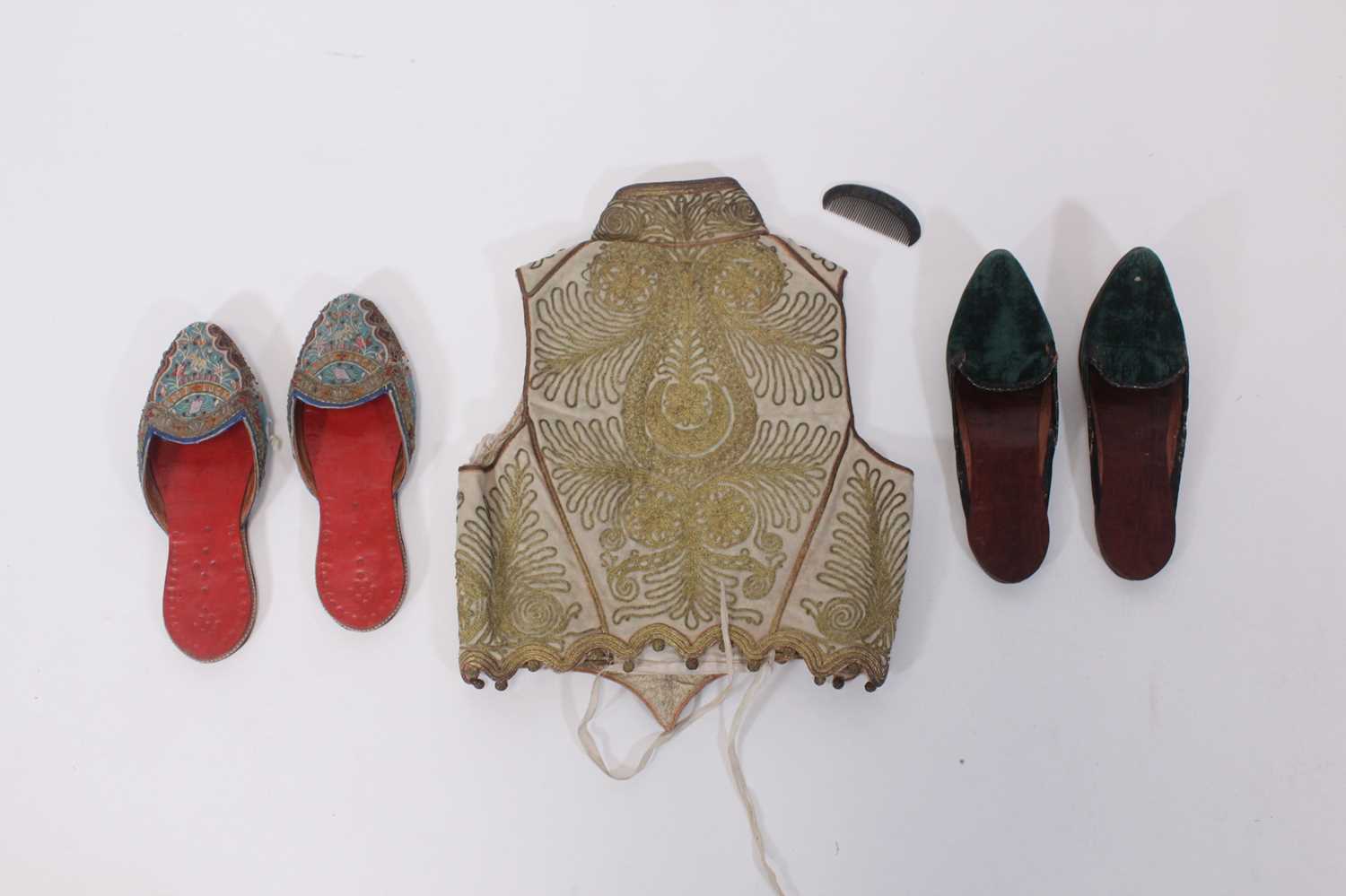 Lot 147 - A ceremonial embroidered vest together with...