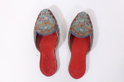 Lot 147 - A ceremonial embroidered vest together with...