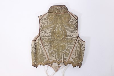 Lot 147 - A ceremonial embroidered vest together with...