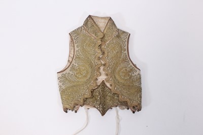 Lot 147 - A ceremonial embroidered vest together with...