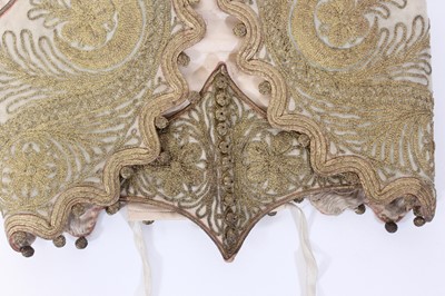 Lot 147 - A ceremonial embroidered vest together with...
