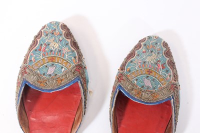 Lot 147 - A ceremonial embroidered vest together with...