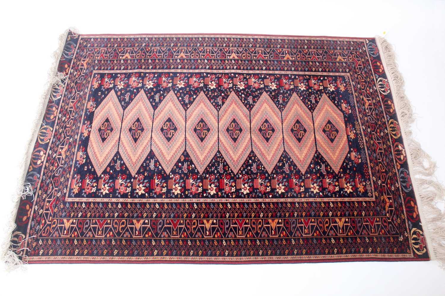 Lot 151 - An Afghan fine wool rug, circa 1950 Of...