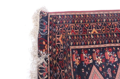 Lot 151 - An Afghan fine wool rug, circa 1950 Of...