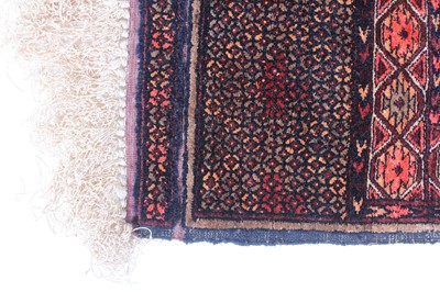 Lot 150 - An Afghan part silk and part fine wool rug,...