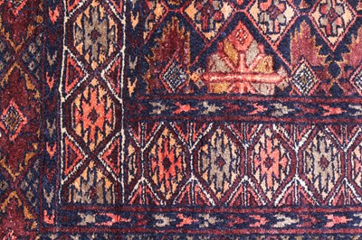Lot 150 - An Afghan part silk and part fine wool rug,...