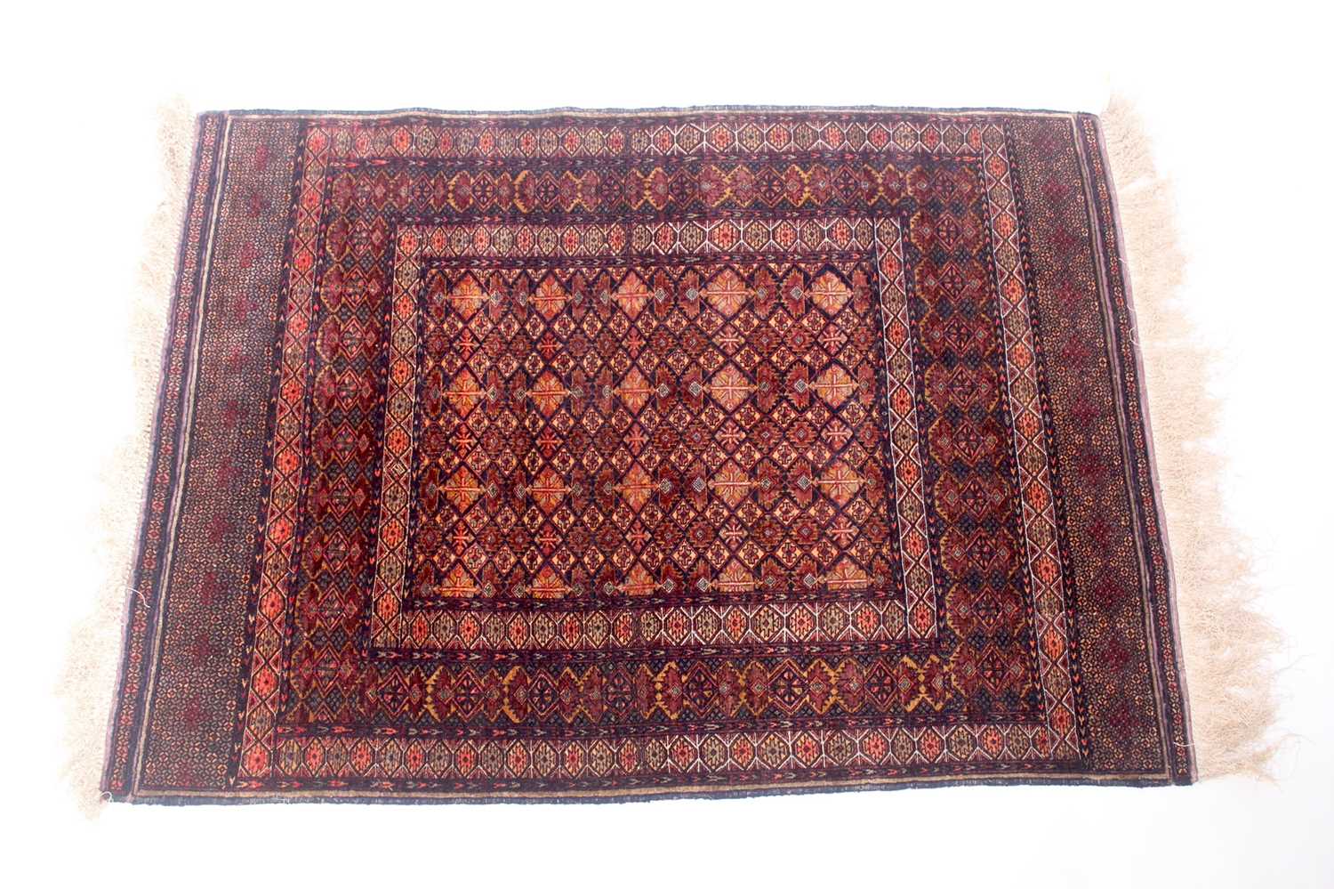 Lot 150 - An Afghan part silk and part fine wool rug,...