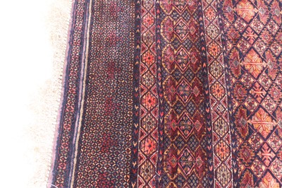 Lot 150 - An Afghan part silk and part fine wool rug,...