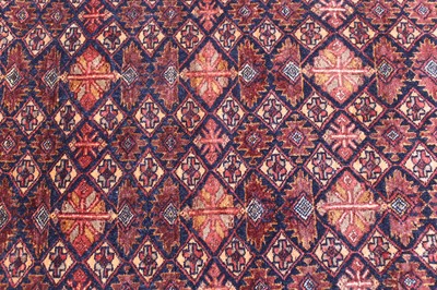 Lot 150 - An Afghan part silk and part fine wool rug,...