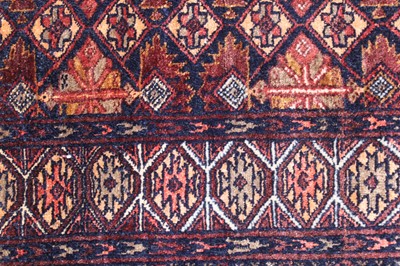 Lot 150 - An Afghan part silk and part fine wool rug,...