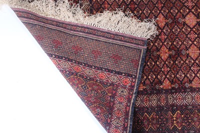 Lot 150 - An Afghan part silk and part fine wool rug,...