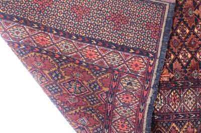 Lot 150 - An Afghan part silk and part fine wool rug,...