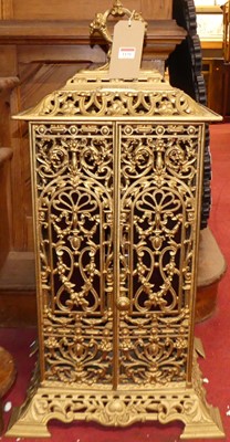 Lot 1131 - A gilt decorated pierced cast iron...