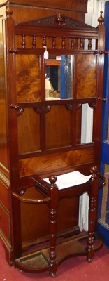 Lot 1132 - An Edwardian walnut mirrorback hallstand, w.77cm