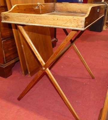 Lot 1134 - A 19th century mahogany butler's twin handled...