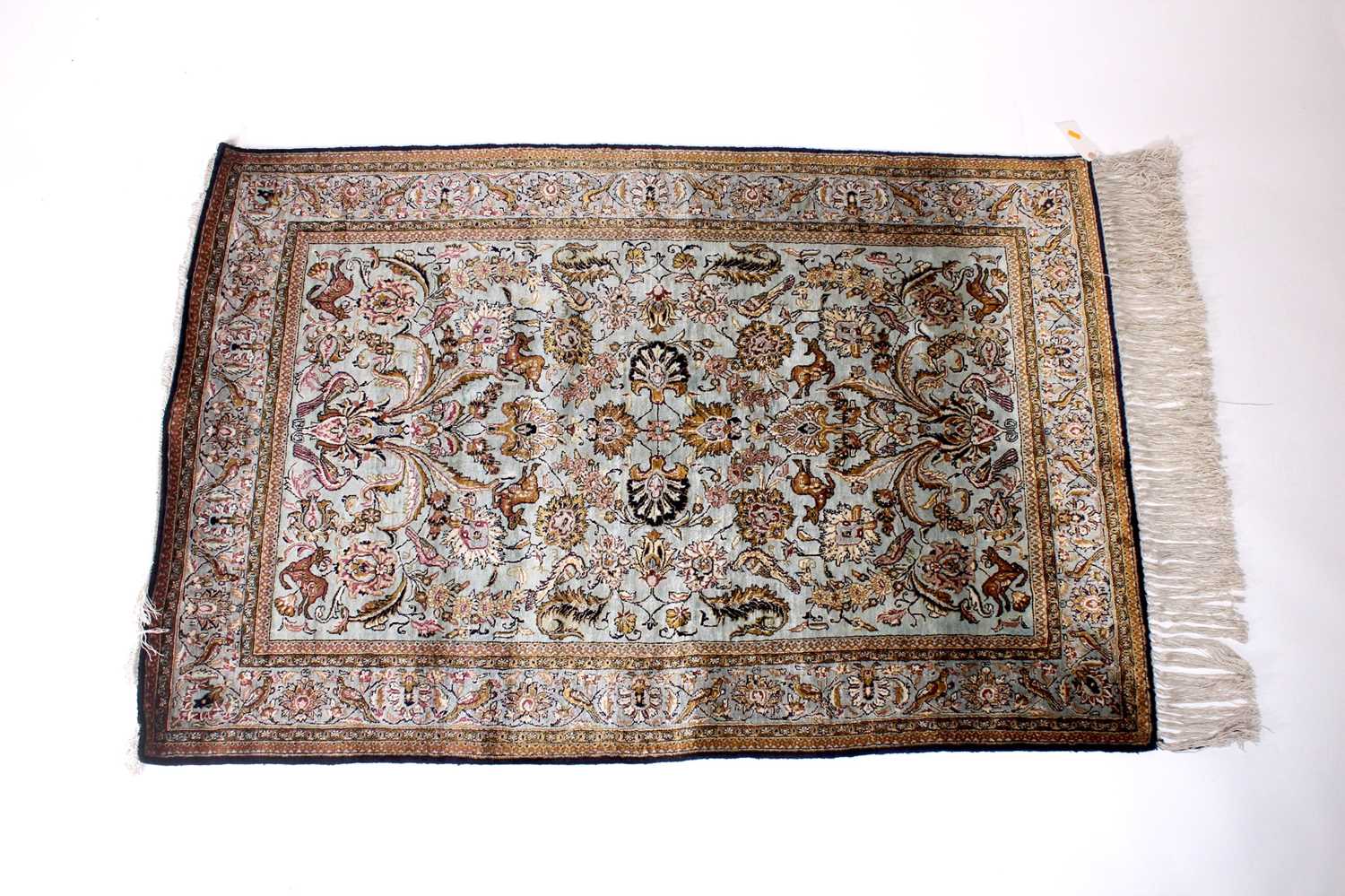 Lot 149 - A Persian Qom silk rug, mid-20th century...
