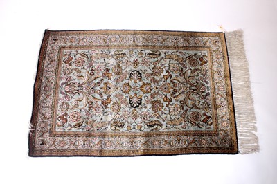 Lot 149 - A Persian Qom silk rug, mid-20th century...