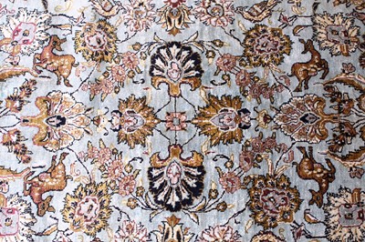 Lot 149 - A Persian Qom silk rug, mid-20th century...