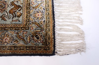 Lot 149 - A Persian Qom silk rug, mid-20th century...