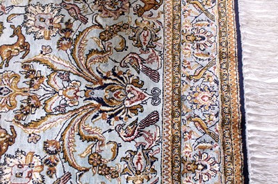 Lot 149 - A Persian Qom silk rug, mid-20th century...