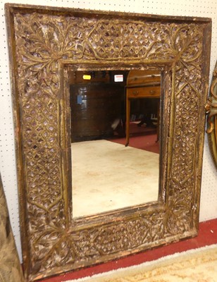 Lot 1153 - A rustic painted and floral relief decorated...