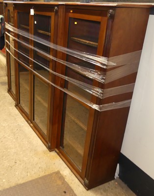 Lot 1163 - A late Victorian mahogany breakfront four-door...