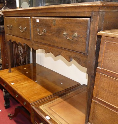 Lot 1169 - An 18th century provincial joined oak two...