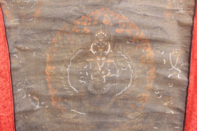 Lot 157 - A Tibetan Thangka of a wrathful deity, early...
