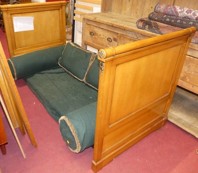 Lot 1199 - A contemporary satin birch single sleigh bed,...