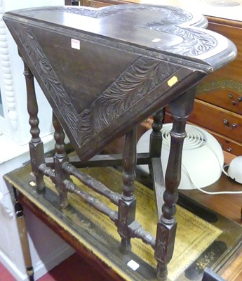 Lot 1230 - An early 20th century floral relief carved...