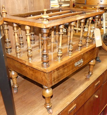 Lot 1238 - A mid-Victorian figured walnut three-division...