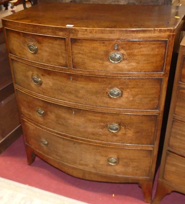 Lot 1250 - A Regency mahogany and crossbanded bowfront...