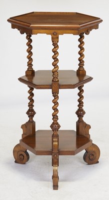 Lot 1252 - A mid-Victorian walnut hexagonal three-tier...