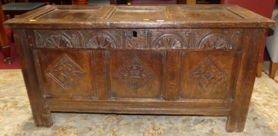 Lot 1257 - An 18th century joined oak three-panel hinge...