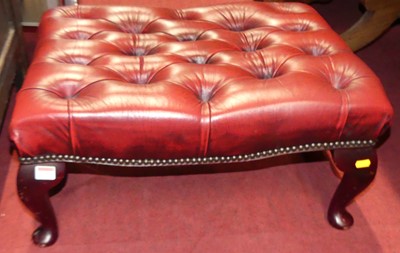 Lot 1259 - A contemporary oxblood red leather buttoned...