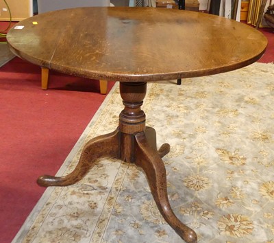 Lot 1260 - A 19th century provincial oak circular...