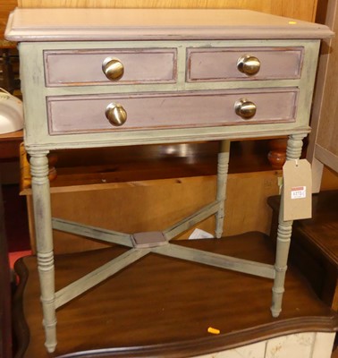 Lot 1272 - A painted three drawer low side table, w.56cm;...