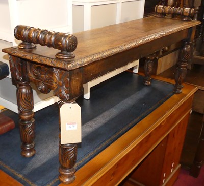 Lot 1275 - An early 20th century relief carved oak window...