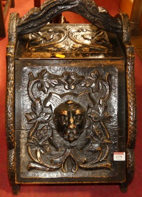 Lot 1279 - An early 20th century ebonised and heavily...