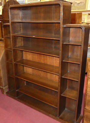 Lot 1283 - An Art Deco oak freestanding open bookshelf,...