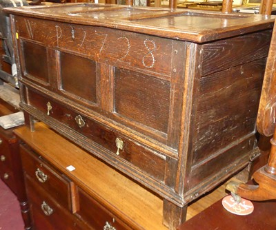 Lot 1289 - An 18th century joined oak three panelled...