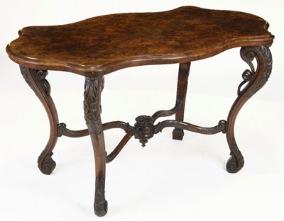 Lot 1292 - A mid-Victorian figured walnut shaped centre...