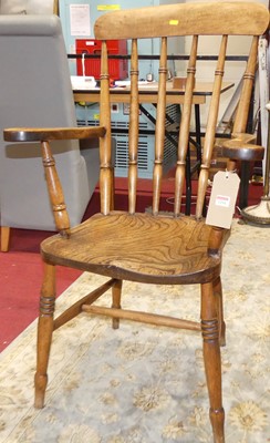 Lot 1294 - An early 20th century elm and beech stickback...