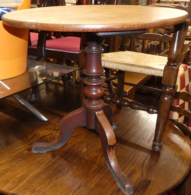 Lot 1308 - A 19th century faded mahogany circular fixed...