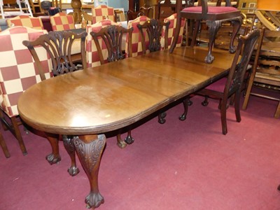 Lot 1314 - An early 20th century mahogany dining suite,...