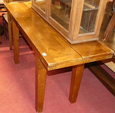 Lot 1325 - A walnut rectangular opposing fold-over dining...